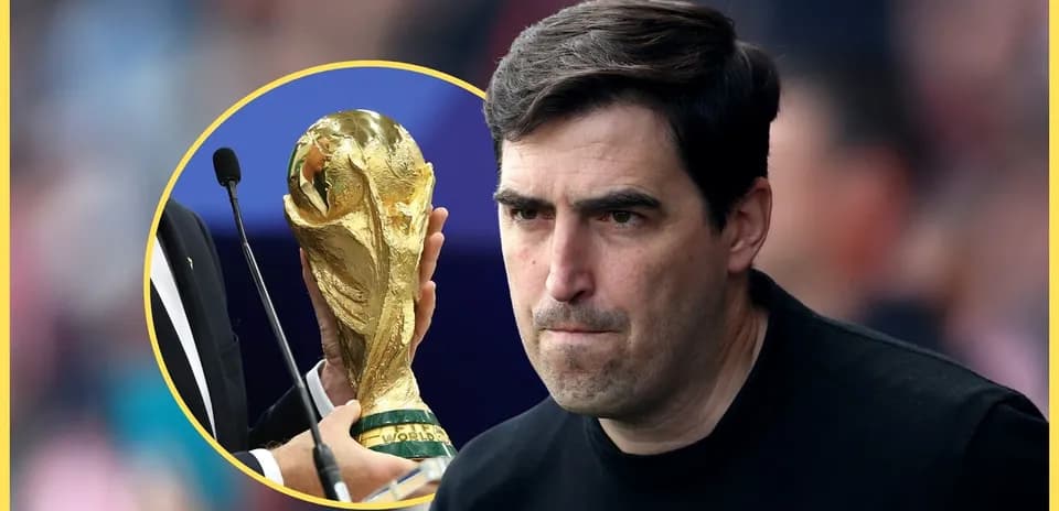 Coach looking at World Cup trophy during event