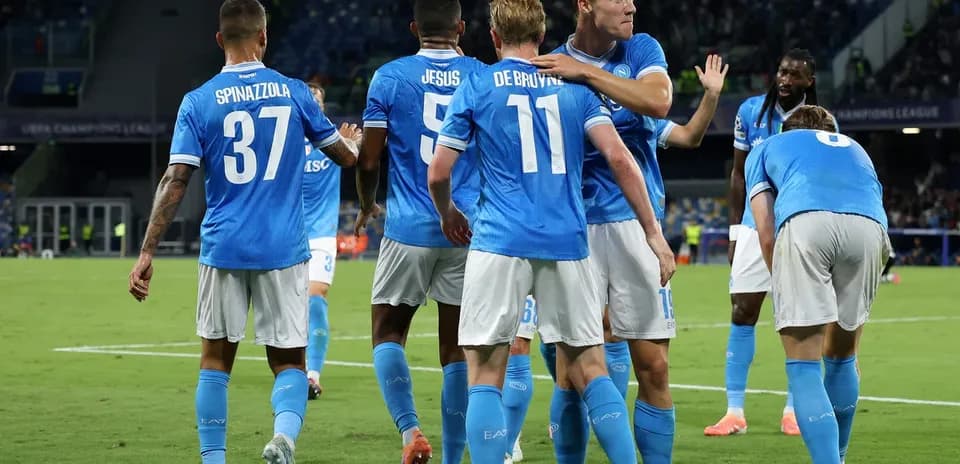 Napoli players celebrating during Champions League match
