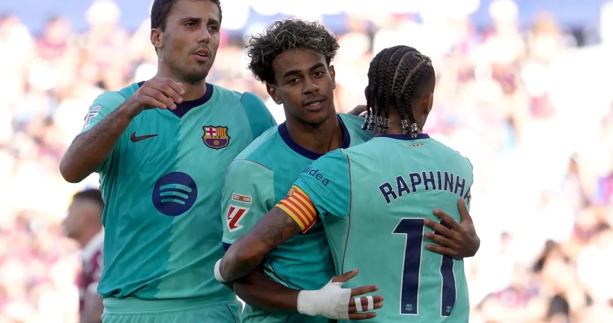 Barcelona players celebrating a goal during match