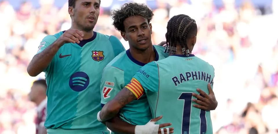 Barcelona players celebrating a goal during match