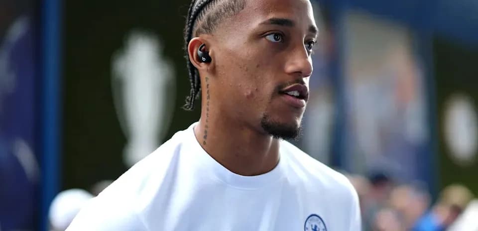 Player walking while wearing Chelsea training shirt