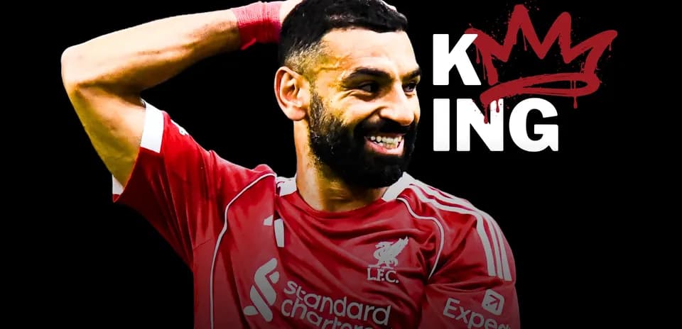 Player celebrating in Liverpool kit with text 'KING'