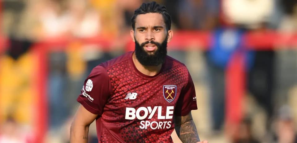 West Ham United player running on the field