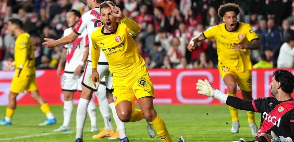 Player celebrating after scoring a goal during match