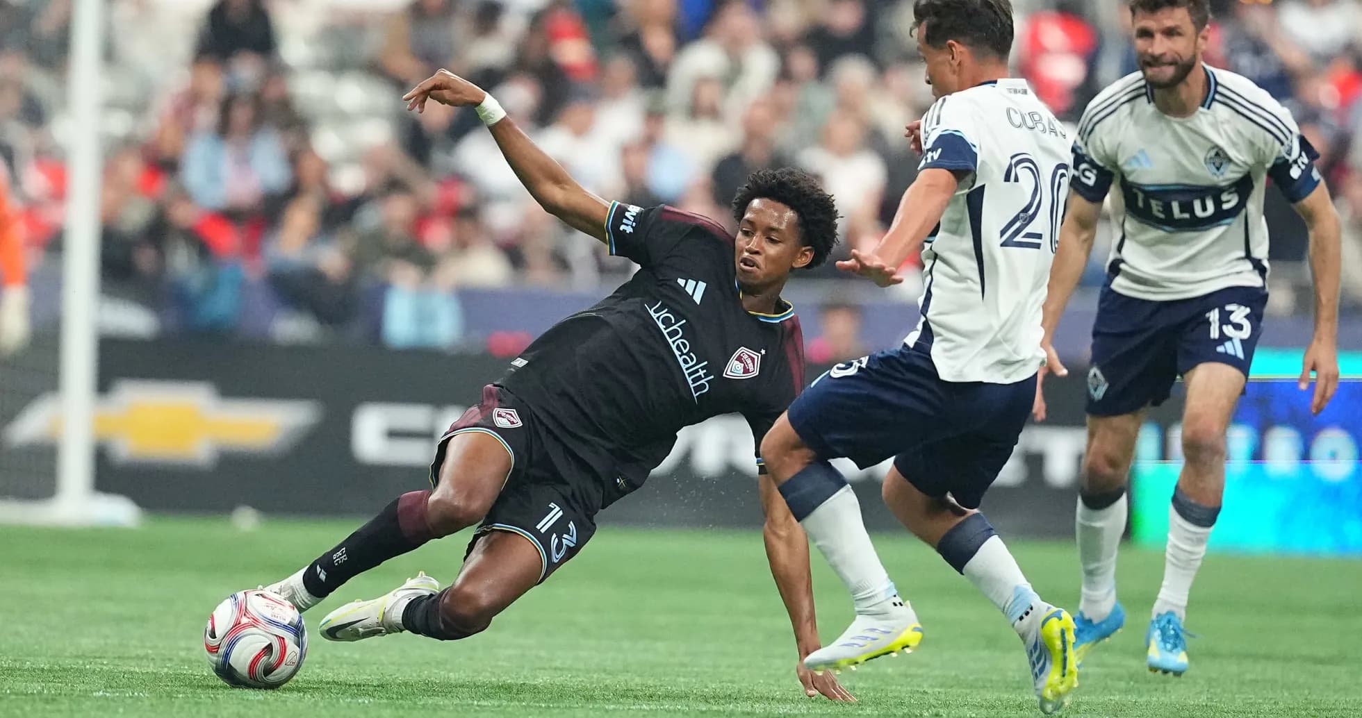 Player tackling during Colorado Rapids II match