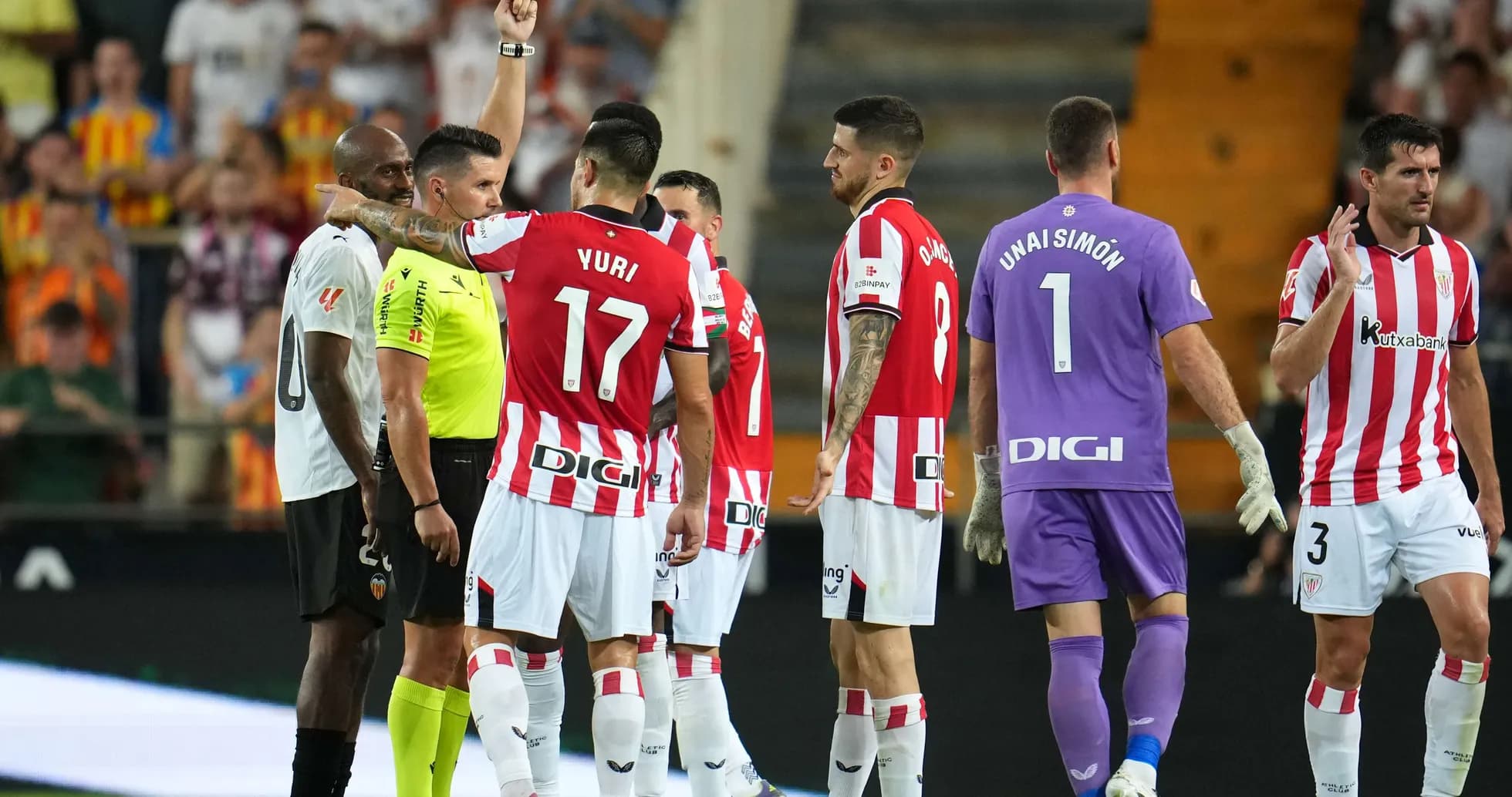 Referee showing red card during Athletic Club match