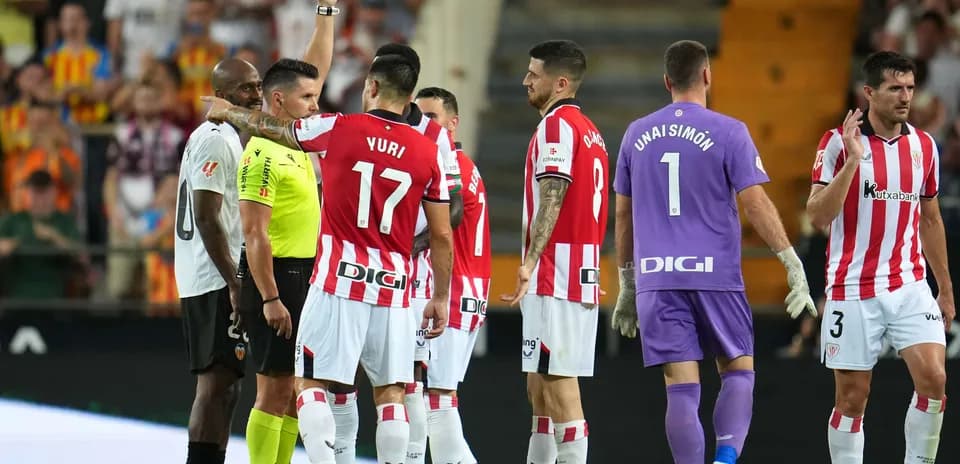 Referee showing red card during Athletic Club match