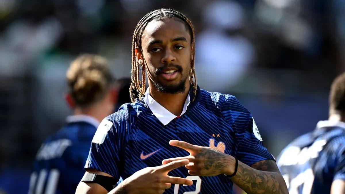 Player gesturing during warm-up in France jersey