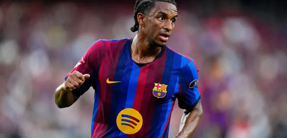 Player in Barcelona jersey running on the field