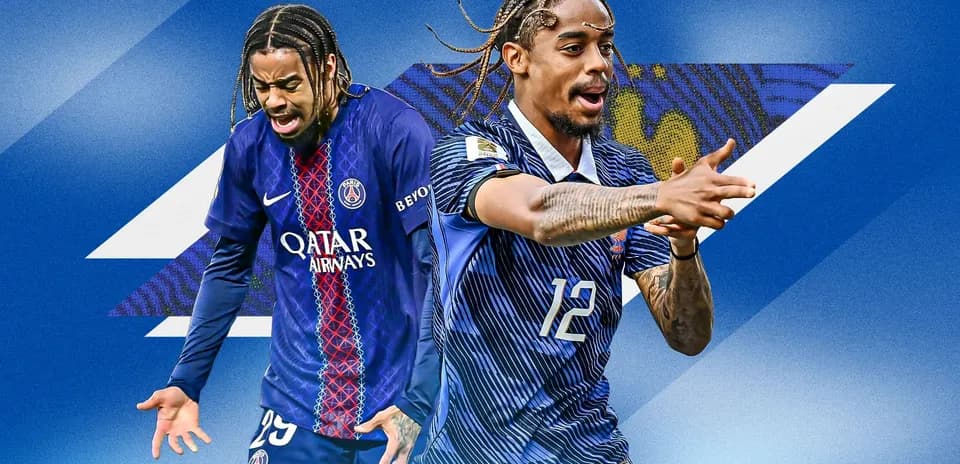 Two football players in different kits celebrating