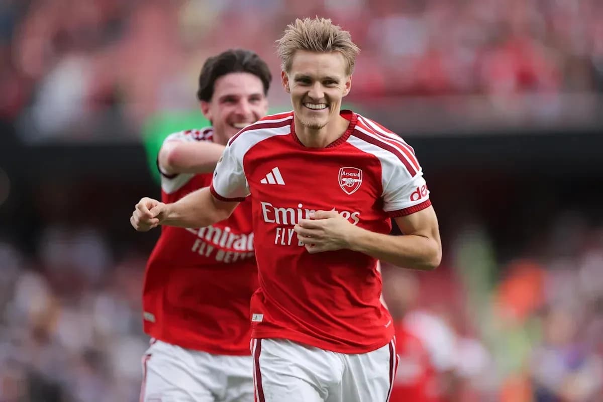 Arsenal players celebrating a goal during a match