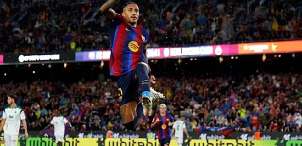 Player celebrating a goal at FC Barcelona match