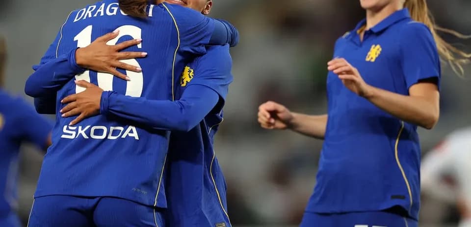Chelsea W players celebrating a goal
