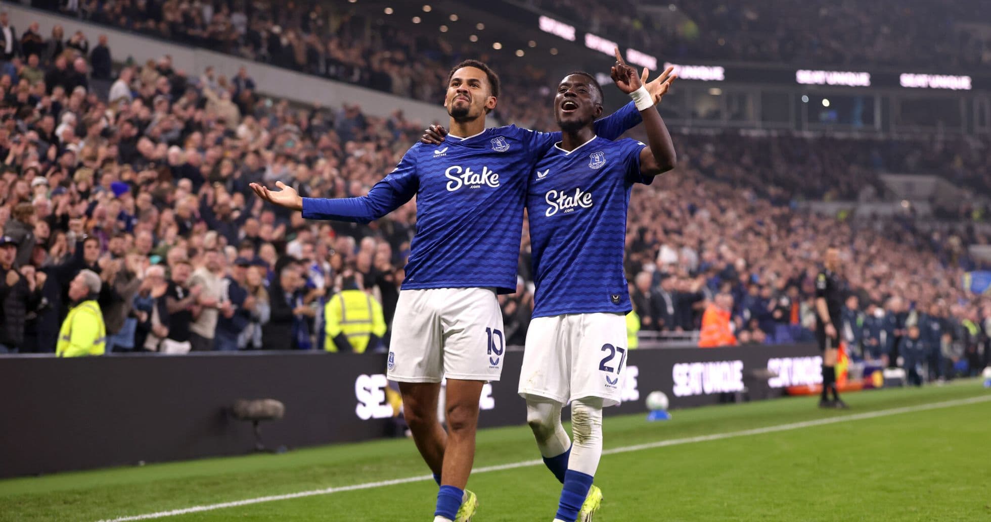 Everton players celebrating a goal during match