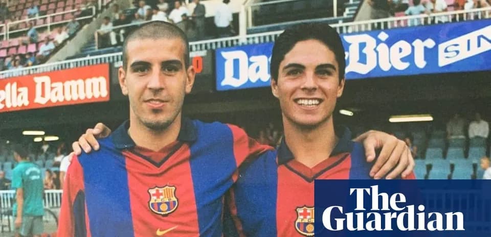 Two players posing in FC Barcelona jerseys