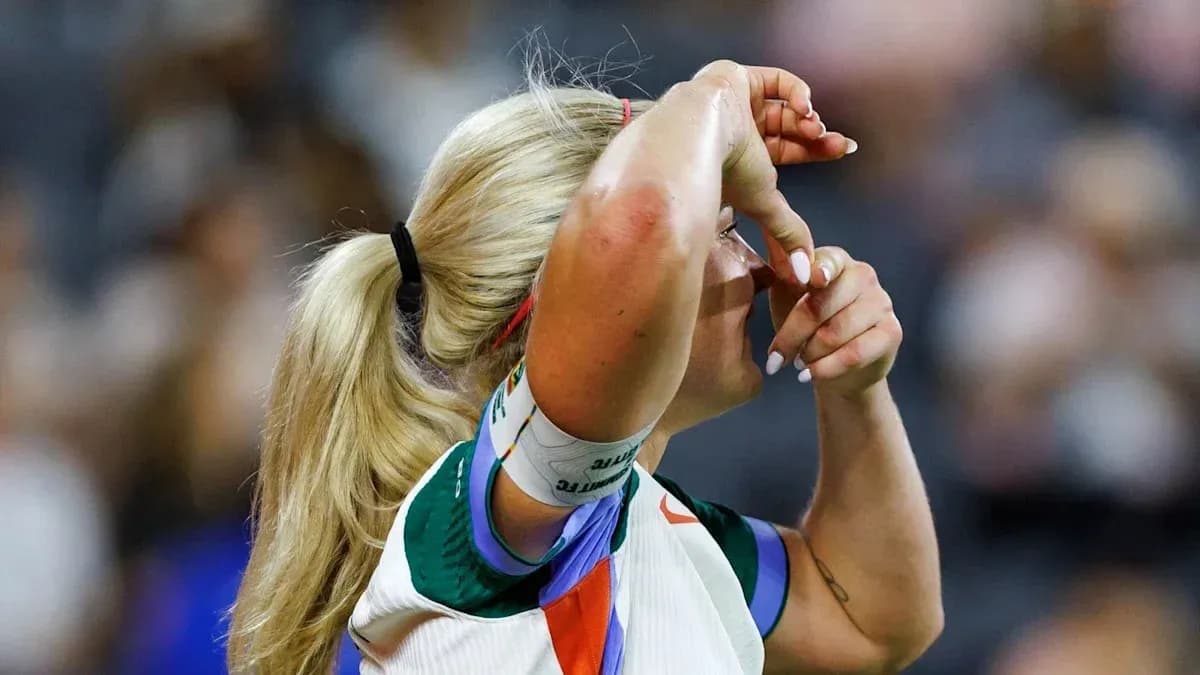 Athlete adjusting headband during sports event