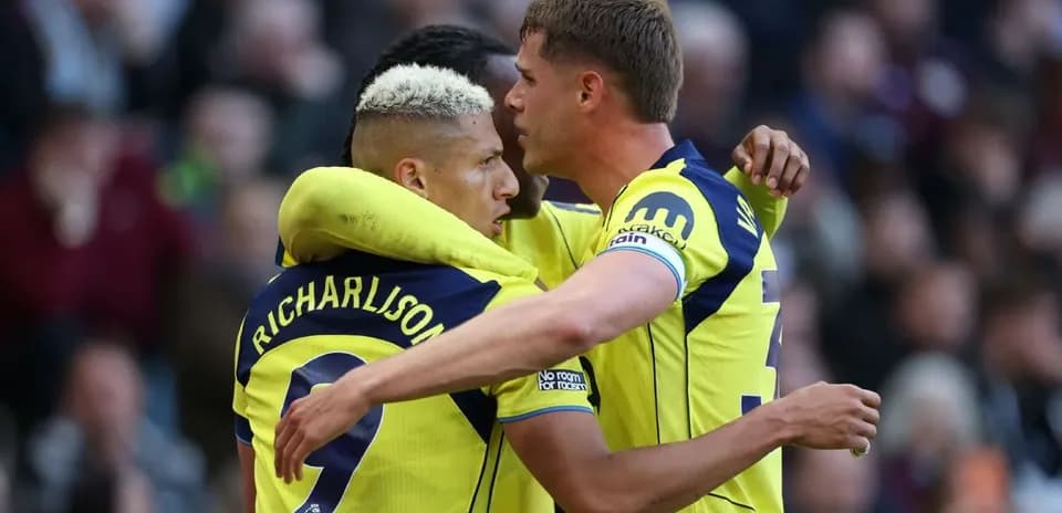 Richarlison celebrating with teammates during match