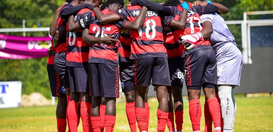 AFCL players in huddle before match