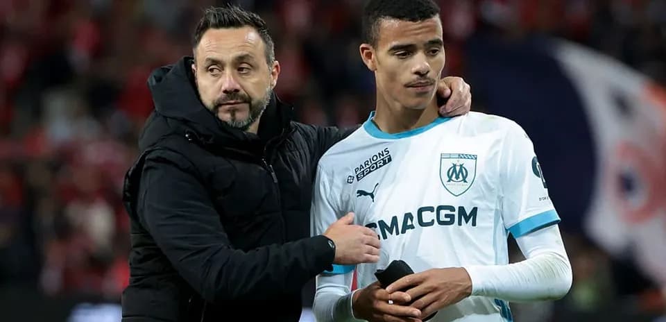 Coach comforting player after a match