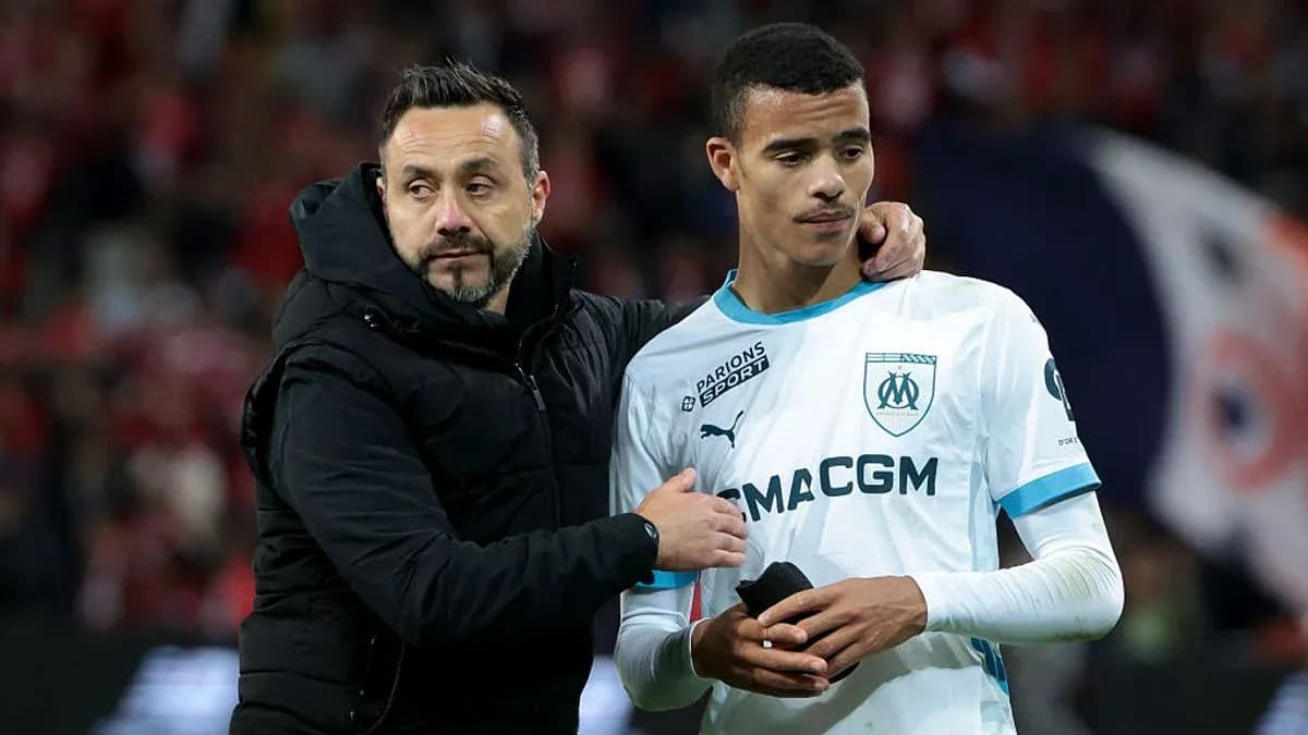 Coach comforting player after a match