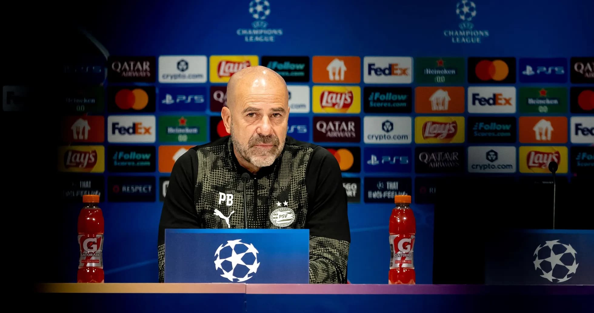 Coach at UEFA Champions League press conference podium