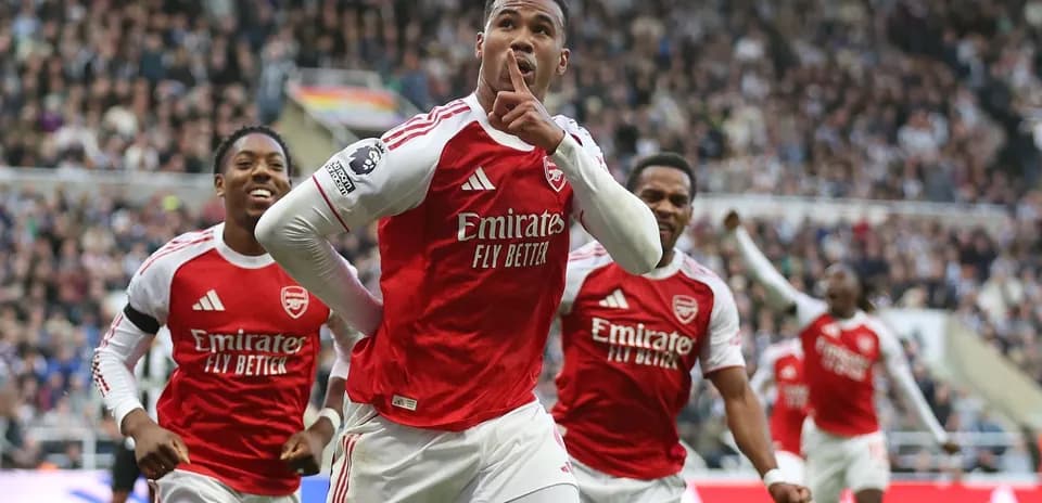 Arsenal players celebrating a goal during match