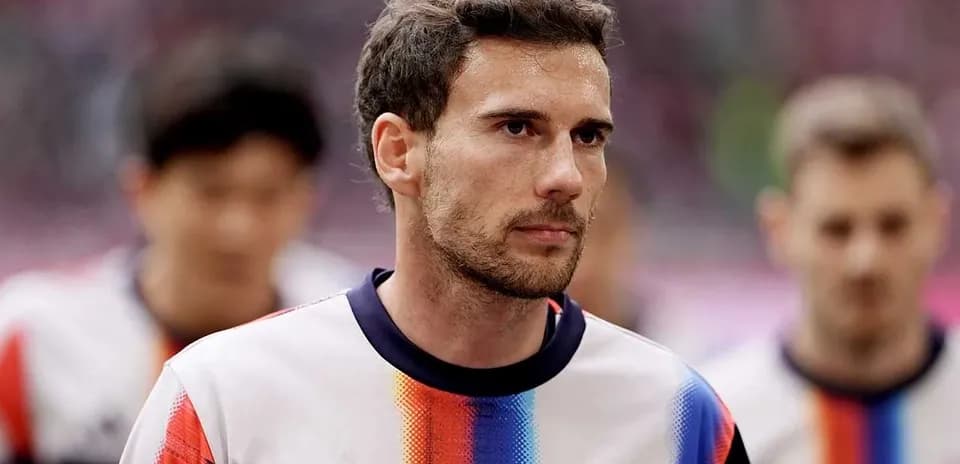 Player in Bayern Munich jersey walking onto the field