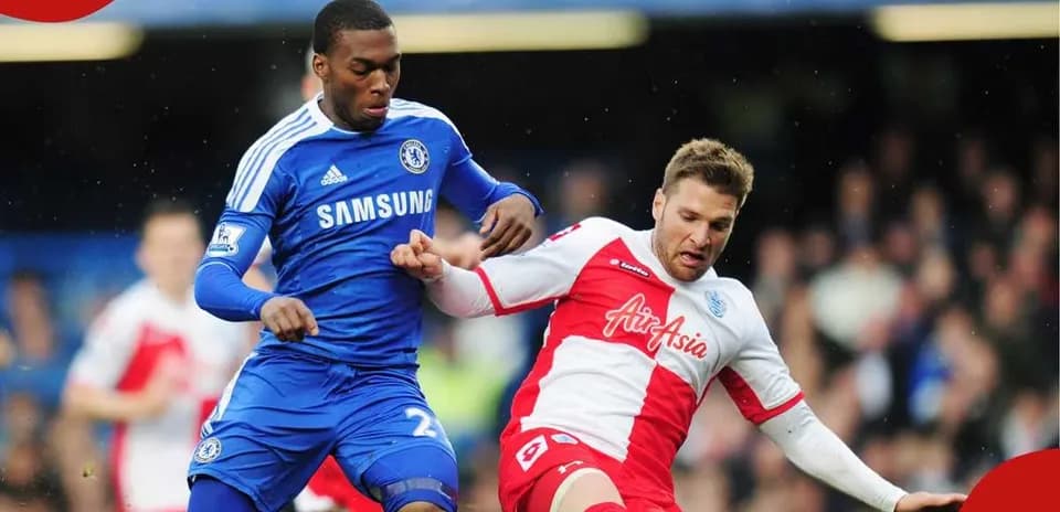 Two players contesting the ball during match action