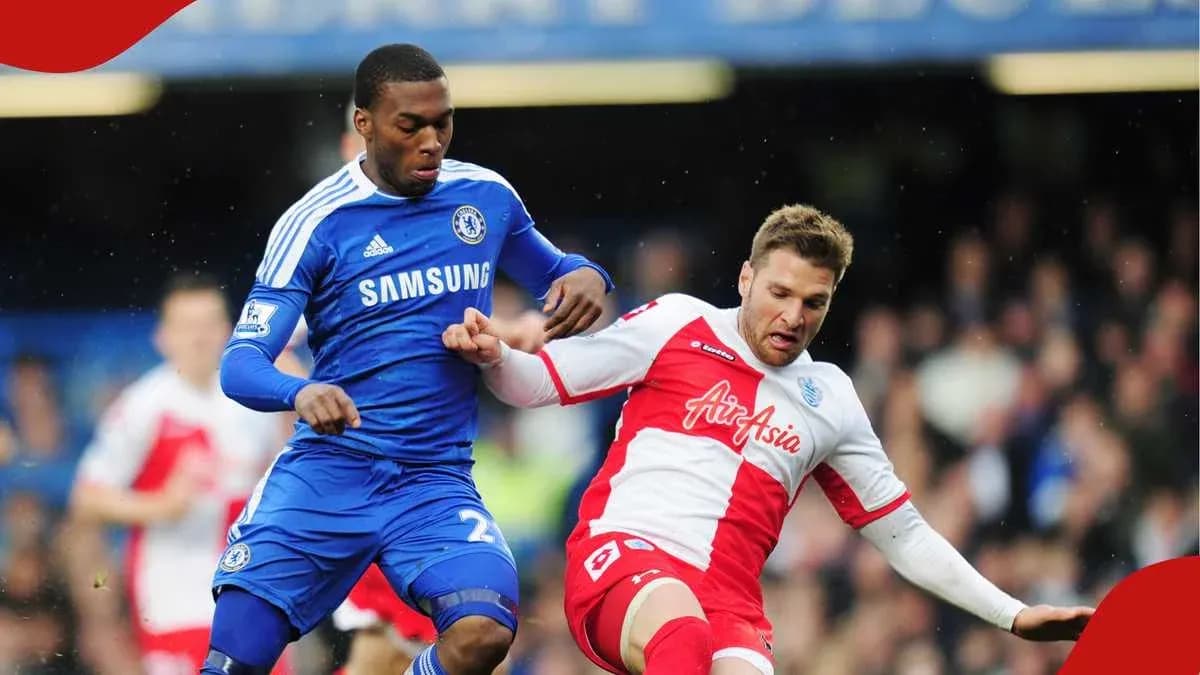 Two players contesting the ball during match action
