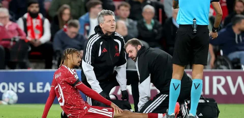 Player receiving medical attention on the sidelines