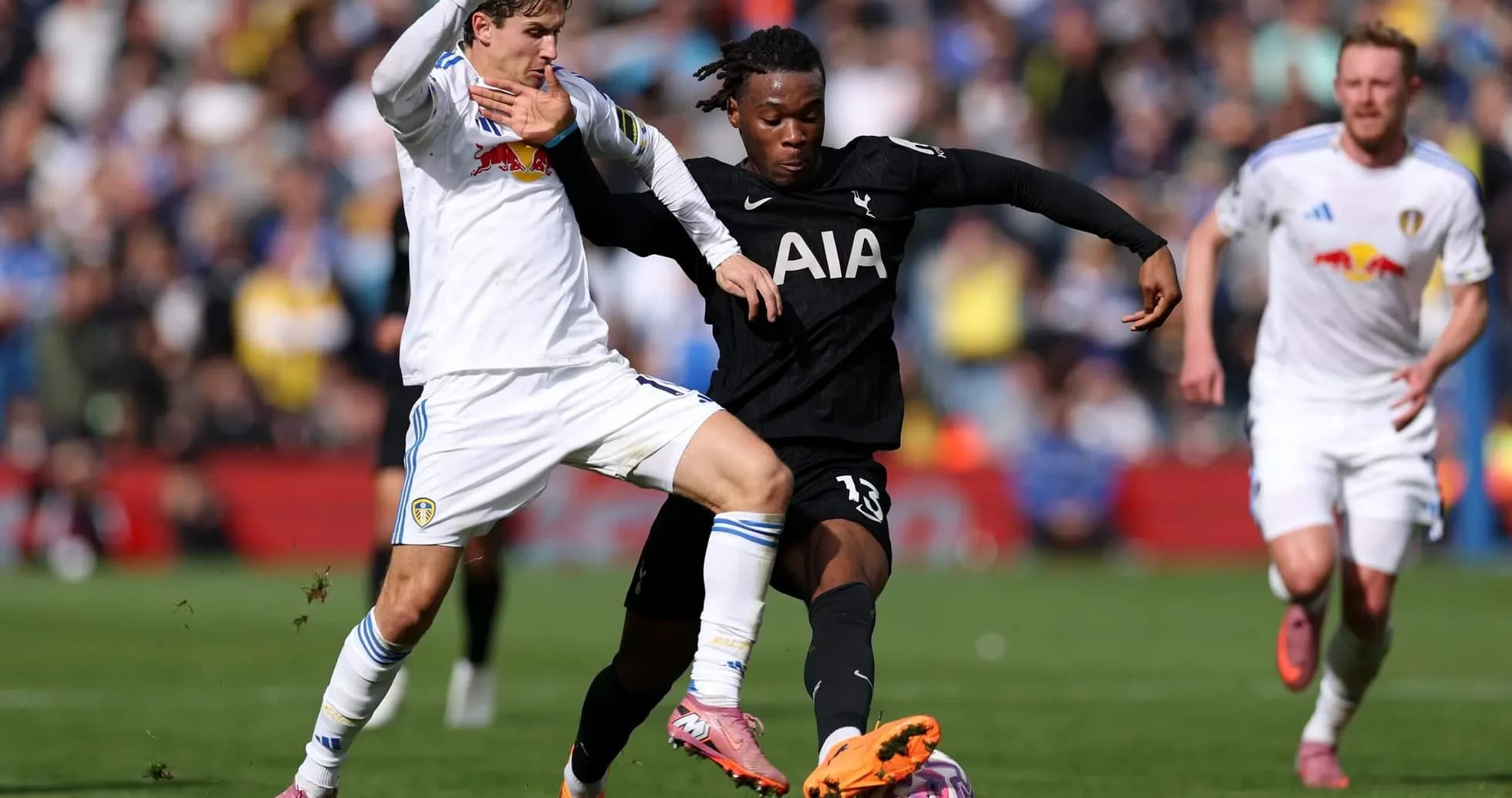 Player challenging for the ball during match