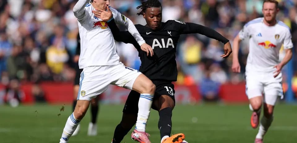 Player challenging for the ball during match