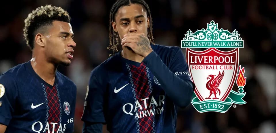 Two players in PSG jerseys during match