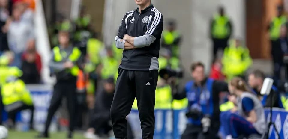 Coach observing the game from the sideline