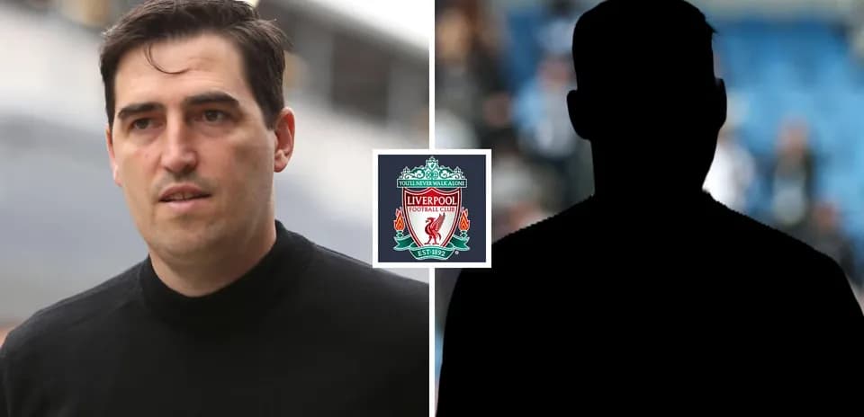 Man walking with Liverpool logo in background