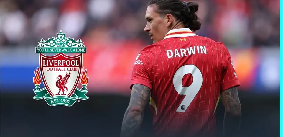 Player in Liverpool jersey with number 9 on back