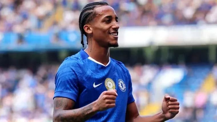 Player celebrating in Chelsea's blue jersey