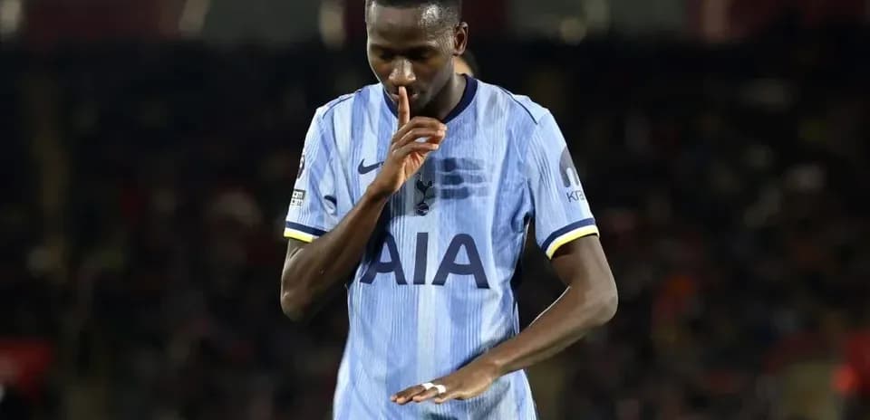 Player shushing fans during match celebration