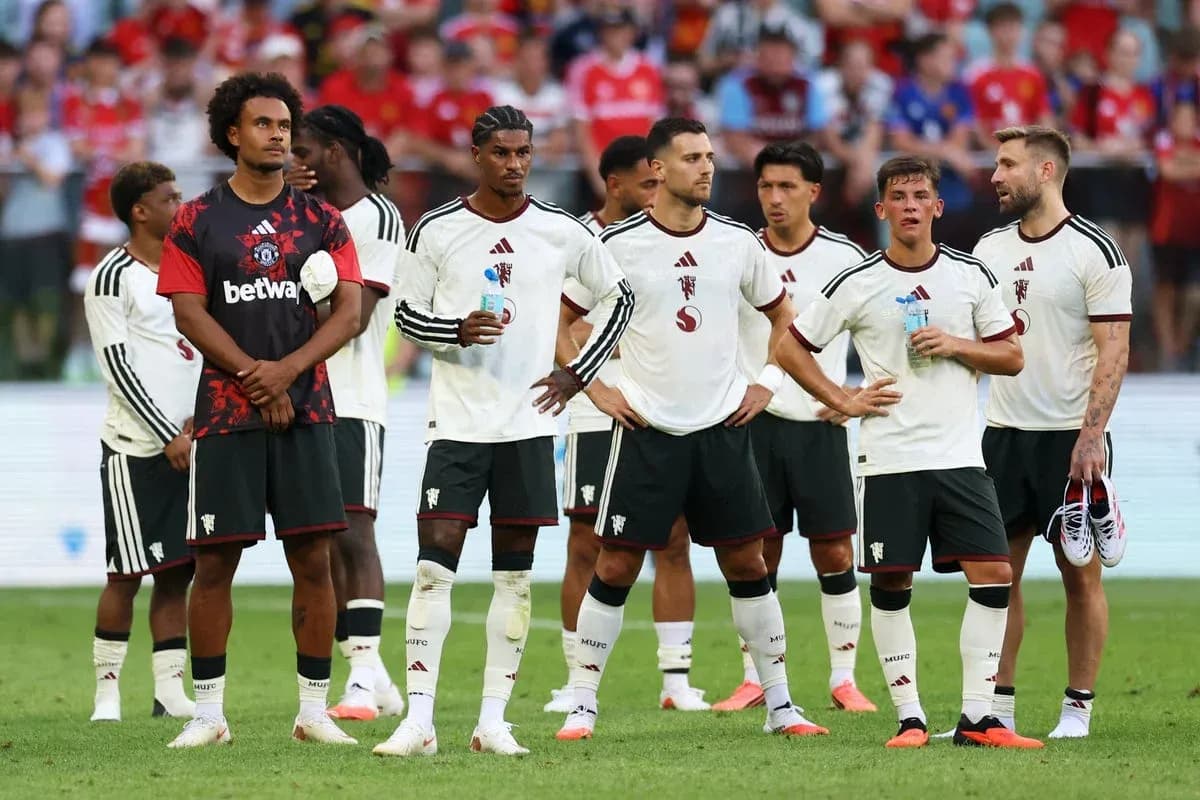 Players lined up during a match, wearing team uniforms