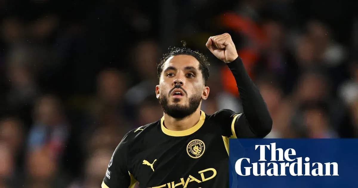 Player celebrating after scoring a goal for Manchester City