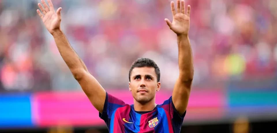 Player waving to fans at stadium during match