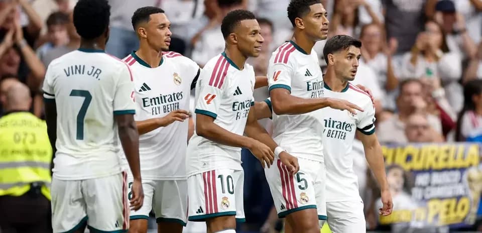 Real Madrid players celebrating a goal