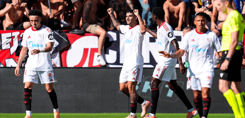 Players celebrating a goal during La Liga match