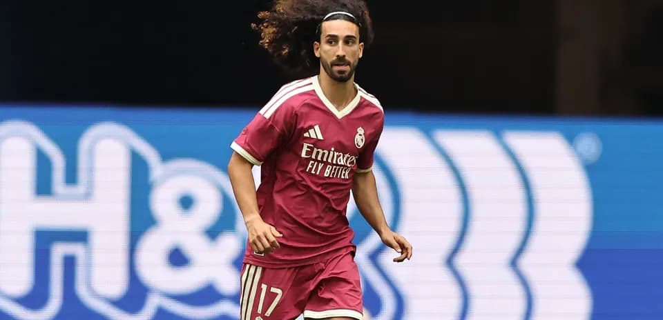 Player in pink jersey running on the field