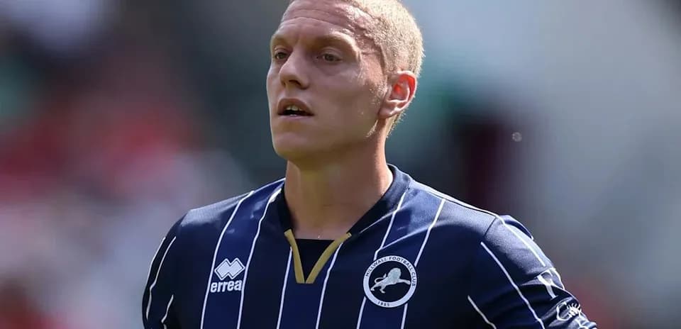 Player in Millwall kit during match action
