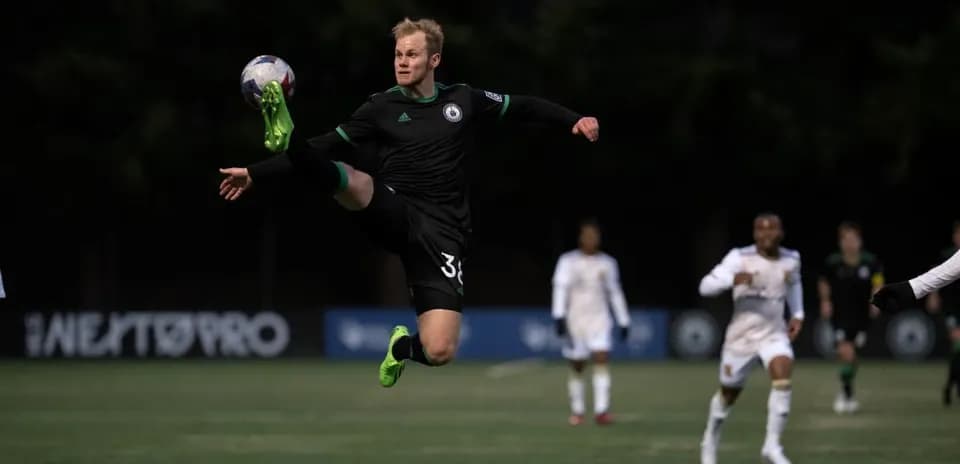 Goalkeeper making a save during match