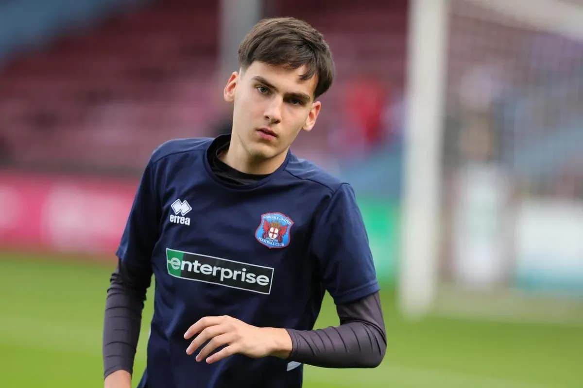 Young player warming up on the pitch