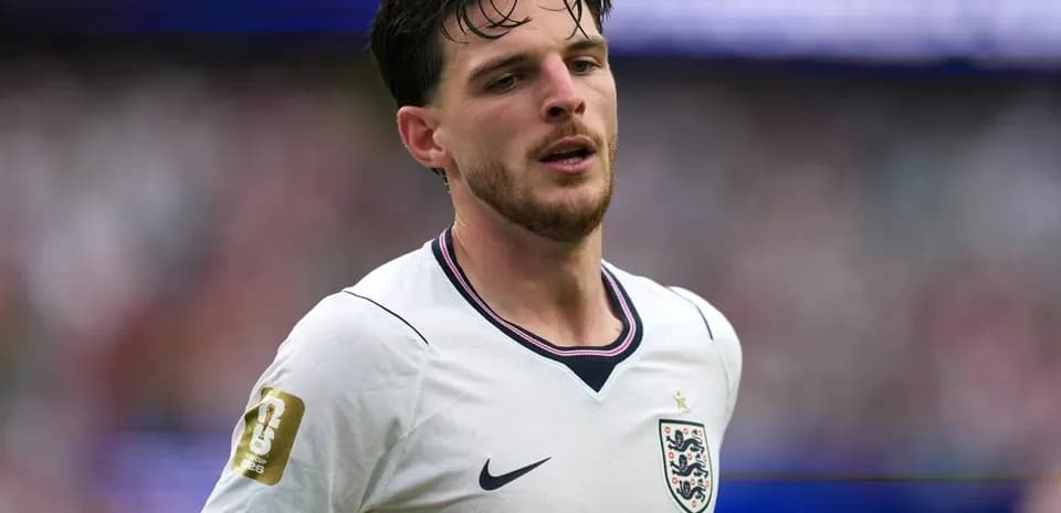 Player in England kit during match on field
