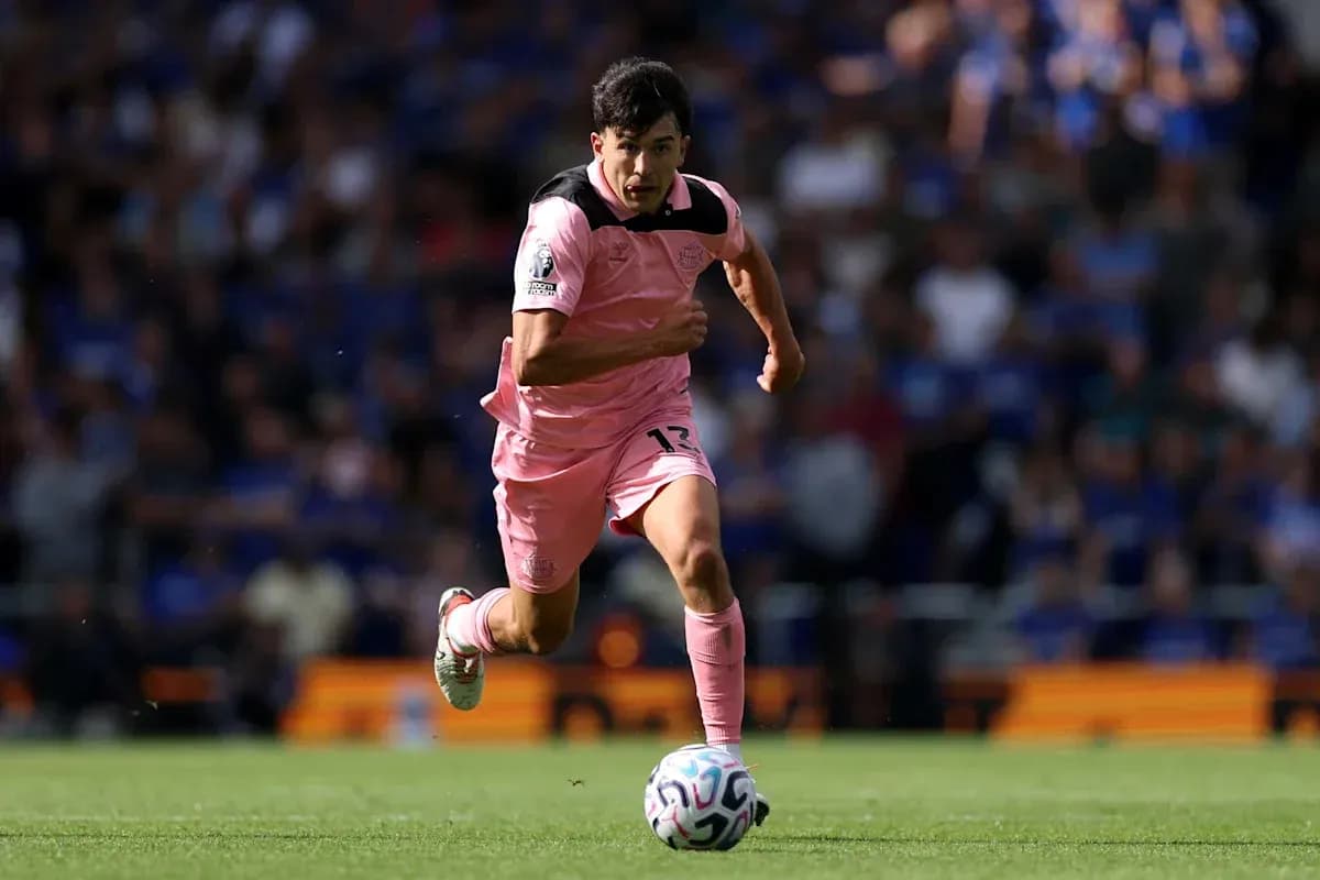 Player sprinting with ball during match