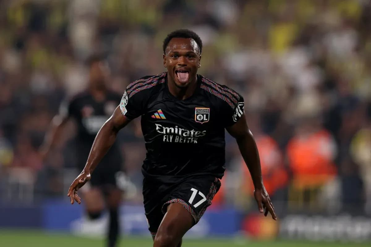 Lyon player celebrating goal during UEFA match